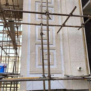 广西 黄金麻花岗岩别墅外墙干挂回纹造型效果