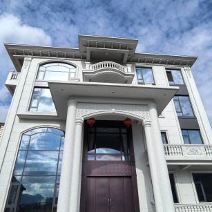 广西白麻别墅外墙干挂石材效果示例