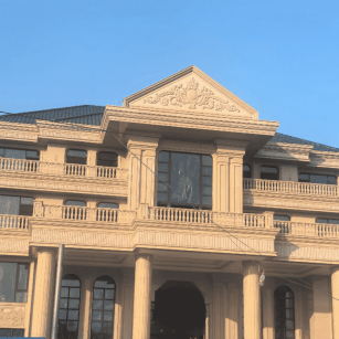 广西黄金麻别墅外墙干挂石材效果示例