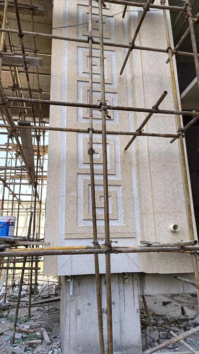 广西 黄金麻花岗岩别墅外墙干挂回纹造型效果