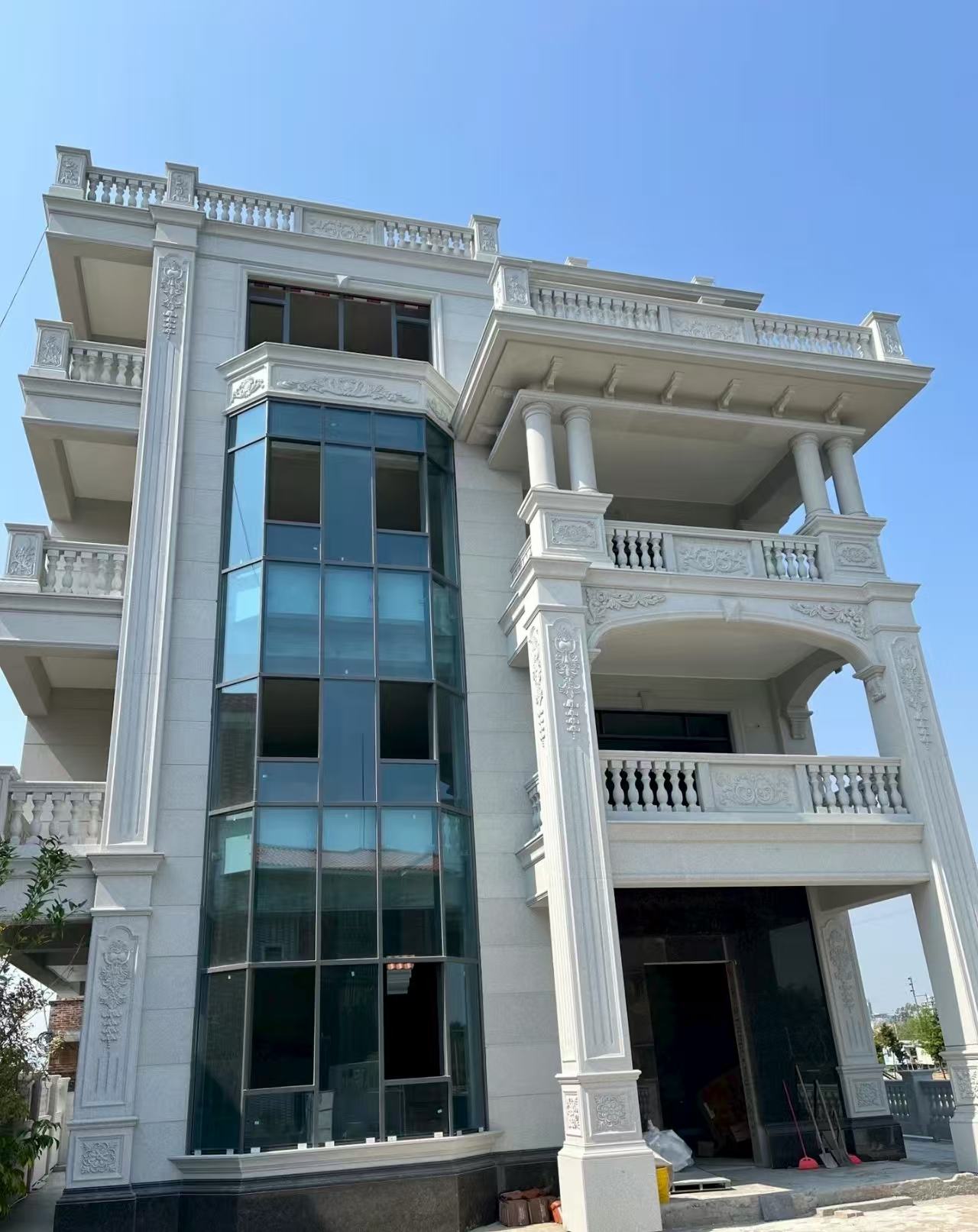 广西 白麻花岗岩别墅外墙干挂效果展示